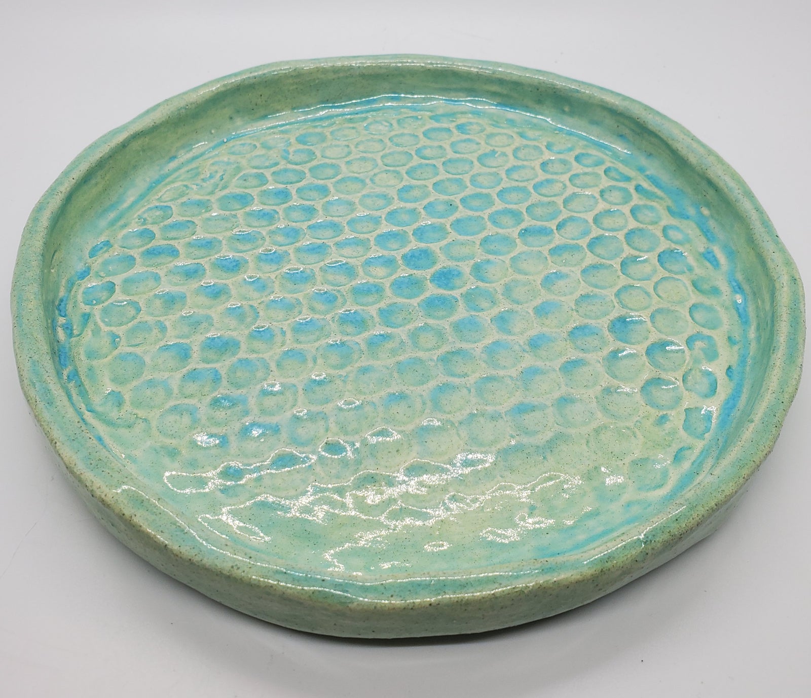 Handmade aqua blue round plate