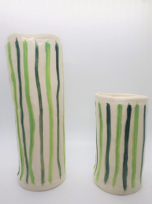 Handmade white and green vertical vases.